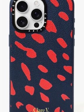 Clare V Navy Leather Phone Case with Red Spot Print.    I phone 14 pro max